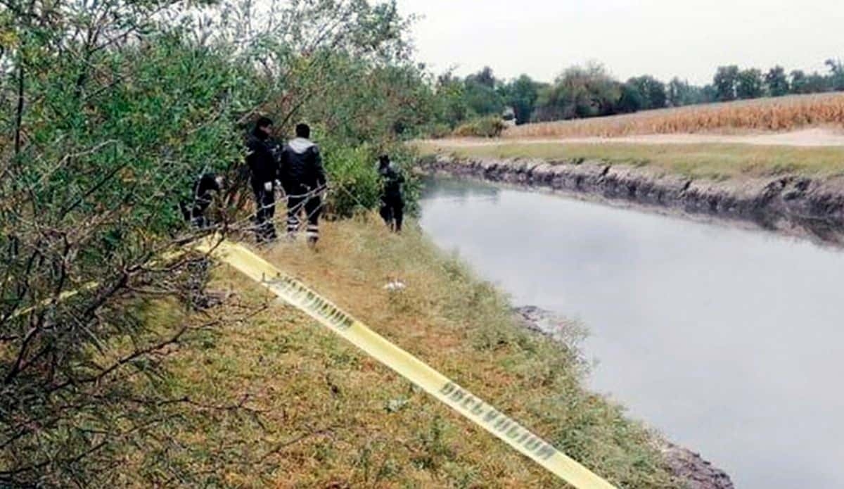 Encuentran cuerpo en un canal de riego