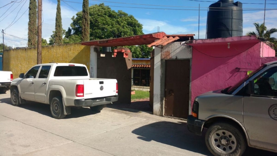 Catean dos casas que presuntamente eran usadas por un grupo criminal