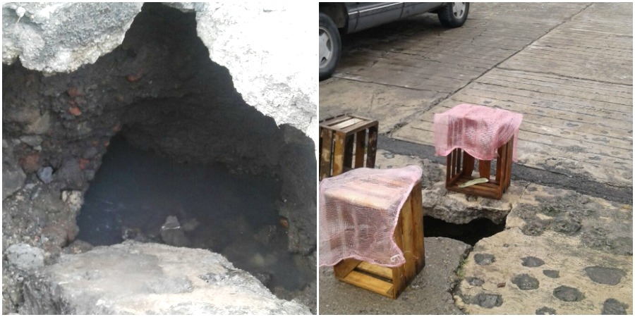 Reportan vecinos hoyo en el pavimento de calle en Atlacomulco