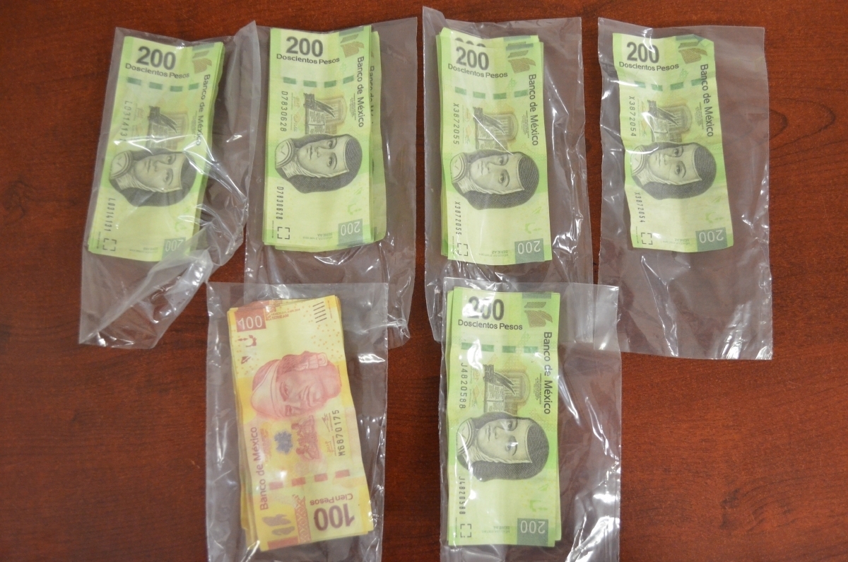 Capturan a un joven en posesión de billetes falsos