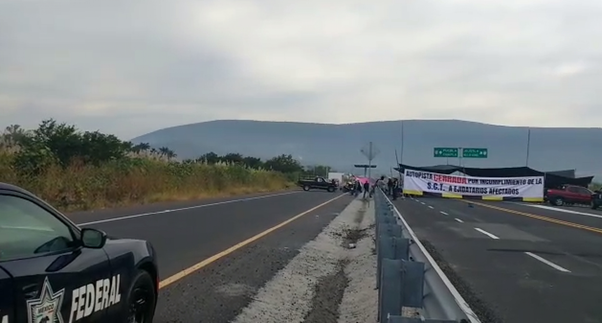 Continúa GN diálogo con ejidatarios ante el bloqueo de la autopista Siglo XXI