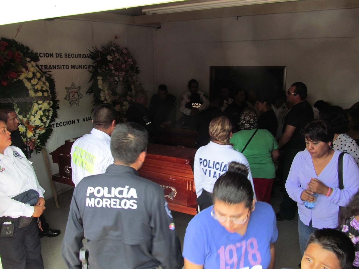 Aún no pagan a deudos de policías ultimados  en Zacatepec